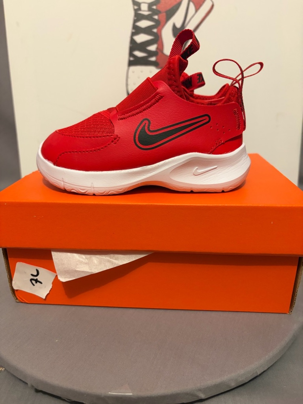 Nike Kids Red Slip-On Sneakers with Black Swoosh